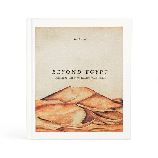 white hard cover book, the cover shows brown mountains and tan background authro Kari Minter, book title: Beyond Egypt Learning to Walk in the Freedom of the Exodus