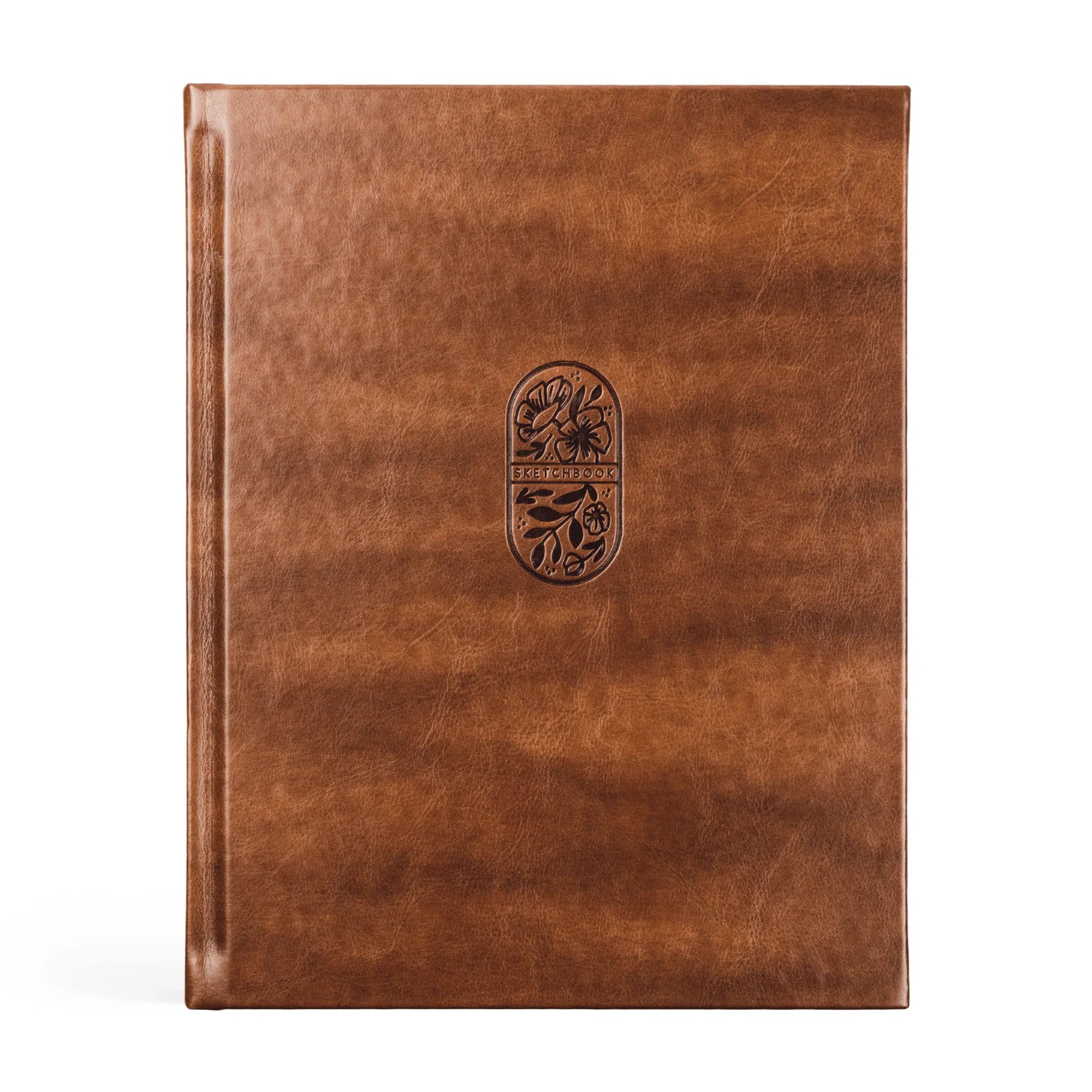 brown hard cover book with oval shapped floral design in front middle