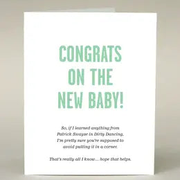 white greeting card with green letters saying Congrats on the New Baby!