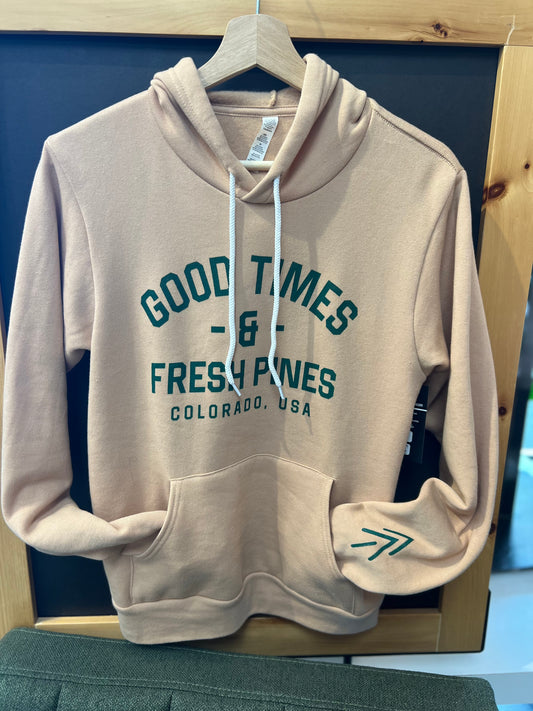 hoodie sweatshirt on hanger, light grey, words that say Good Times & Fresh Pines Colorado USA on the front, left sleeve near the hand is 2 pine trees that look like arrows